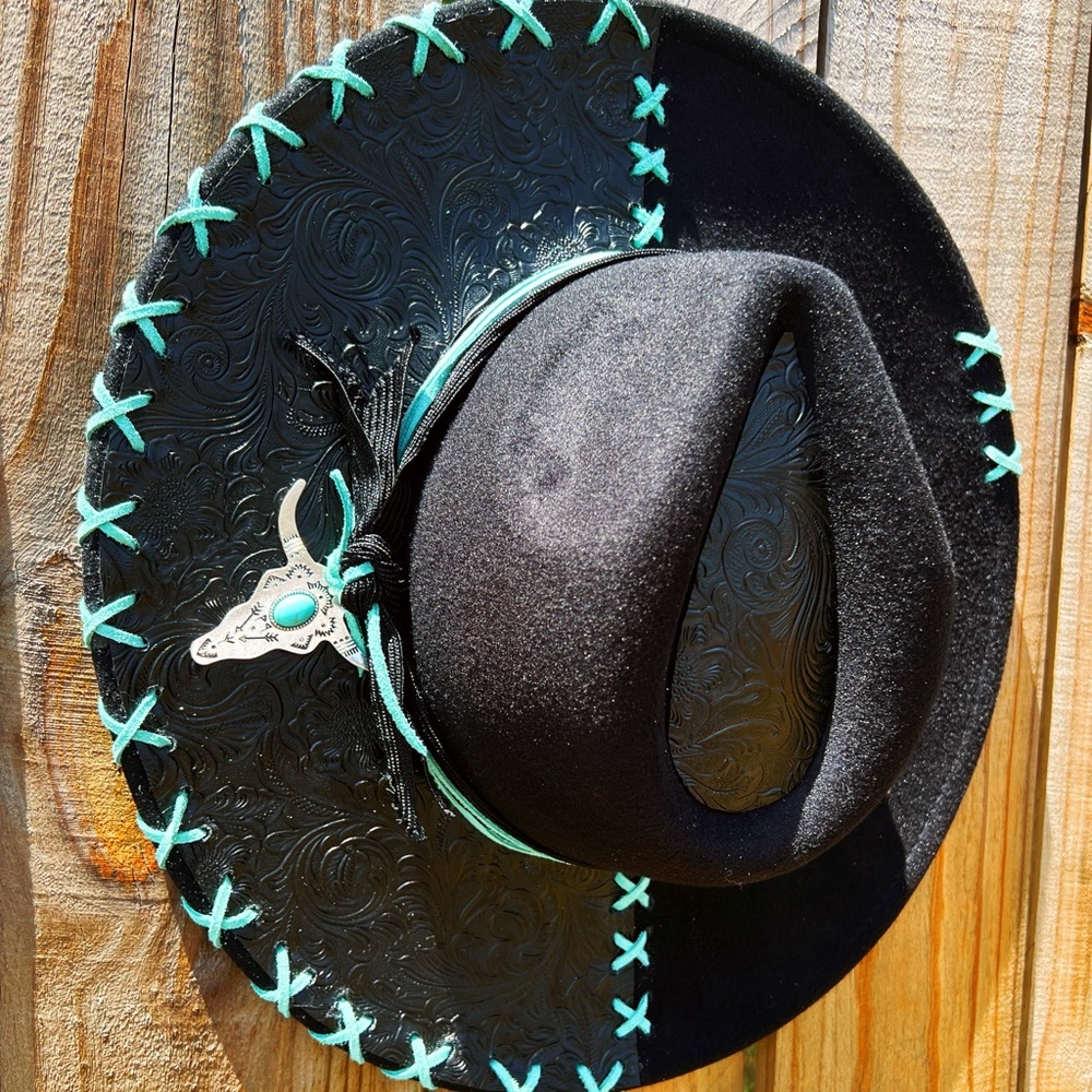 Felt hat with fake leather patch on the side with teal leather trim. Handmade.